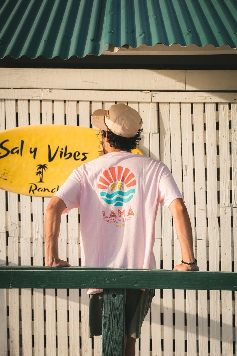 Pink LAMA Beach Life graphic tee photographed in Aruba